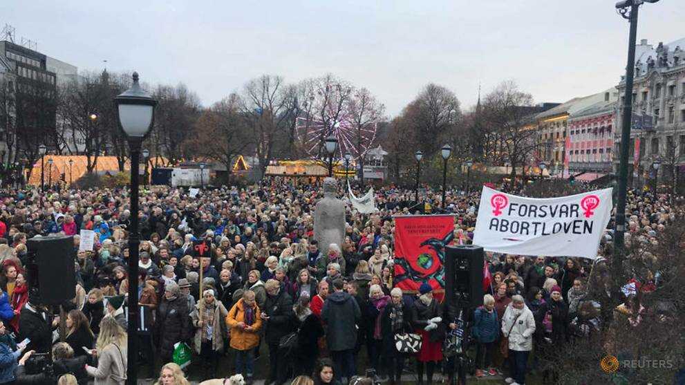 people-hold-placards-during-a-demonstration-against-changes-of-the-country-s-abortion-law-in-oslo-1.jpg